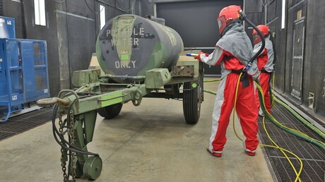 sandblasting cabinet [image courtesy of Clemco Industries]